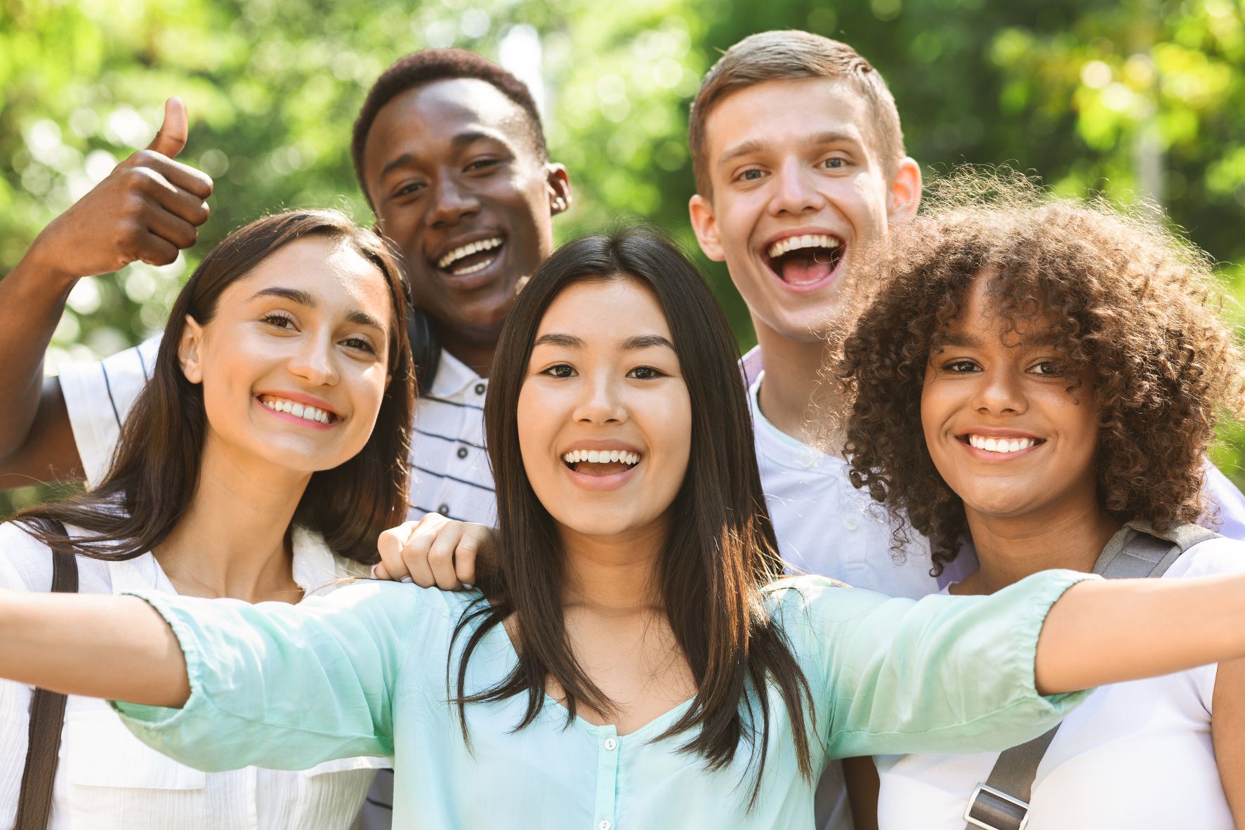 Group of young adults wishing you a happy birthday