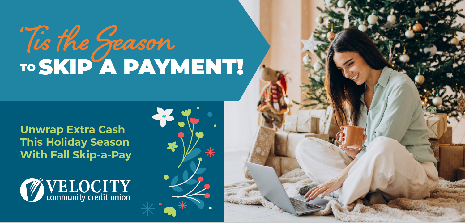 Skip a Payment. Unwrap extra cash. Young woman looking at laptop nest to a Christmas tree.